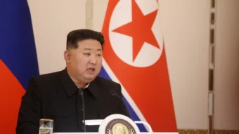 Kim Jong Un mentions Trump by name for the first time since his inauguration and signals readiness for talks with the U.S. if conditions are met.